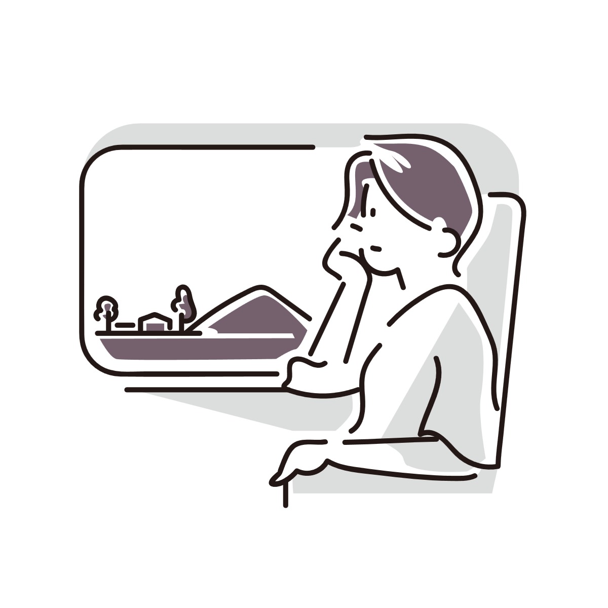 車窓から外を眺める女性の画像。